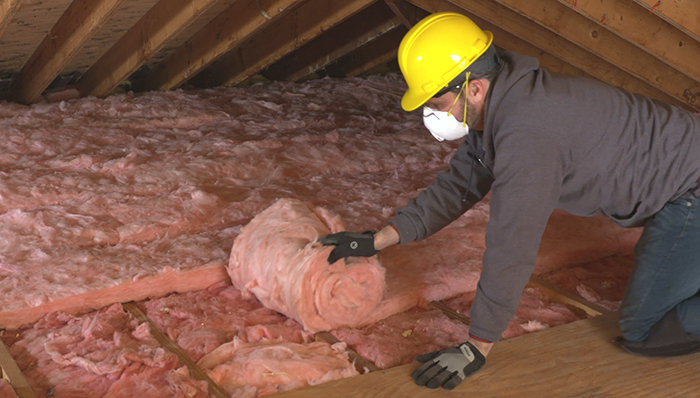 install-insulation-roll-out-more.jpg